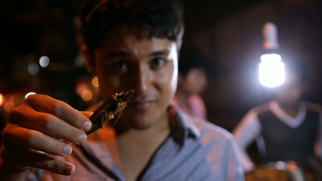 Kevin about to eat Fried Grasshopper - Phnom Penh - Cambodia - #FoodFriday: Eating Bugs or Establishing Businesses, Trust Your Gut - Kevin Longa - kevinlonga.com