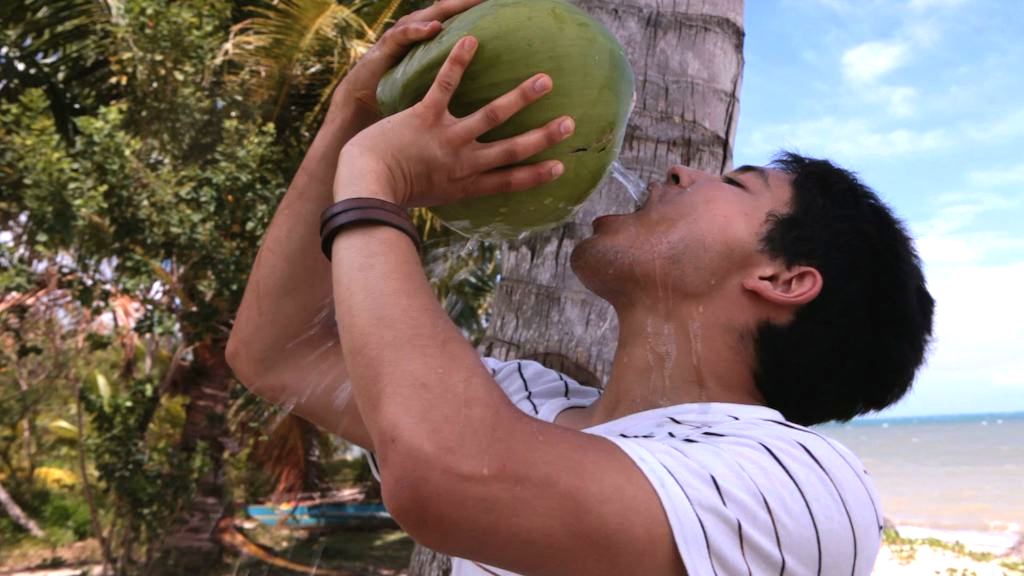Kevin Longa drinking a coconut - #FoodEntrepreneur Friday: Fail Until You Succeed, Try Not to Go (Coco)Nuts