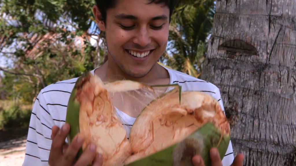 Kevin Longa enjoying a coconut - #FoodEntrepreneur Friday: Fail Until You Succeed, Try Not to Go (Coco)Nuts