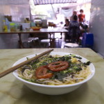 A bowl of Bun Oc Soup (Snail Soup) in Hanoi, Vietnam - Kevin Longa - kevinlonga.com